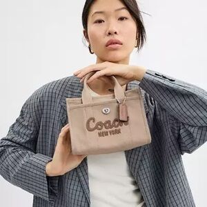 Coach Dark Brown Jacket with Light Tan Bag